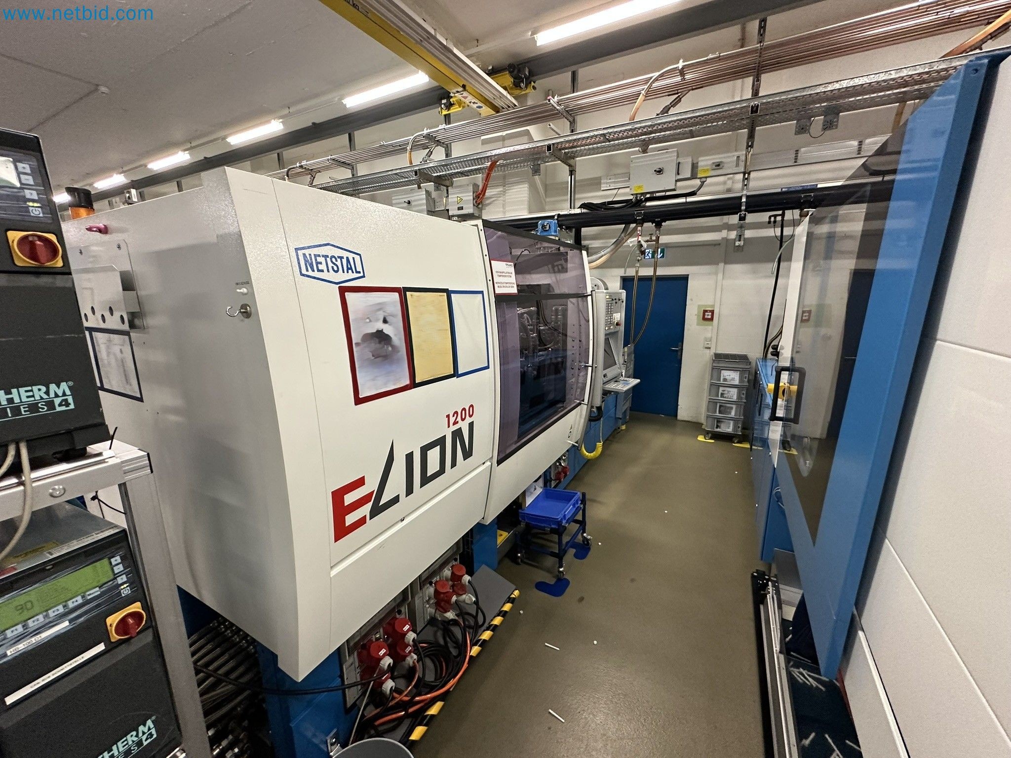 Spritzgießmaschine Netstal Elion 1200-270